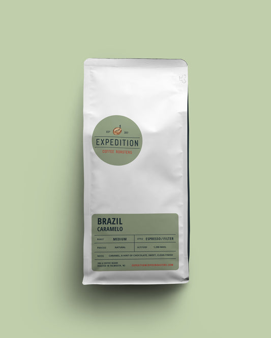 Coffee bag of Brazil beans labeled 'Expedition Coffee Roasters' on a light green background
